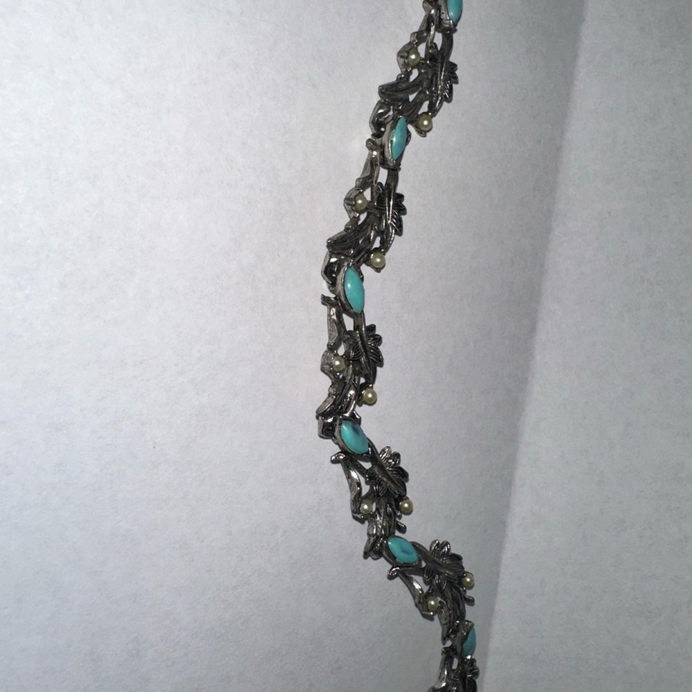 Intricate Silver Bracelet with Turquoise Accents